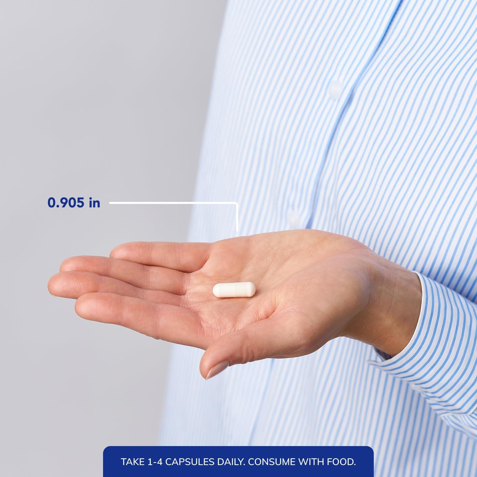 Bottle pours Pure Encapsulations Magnesium Citrate capsules into a glass