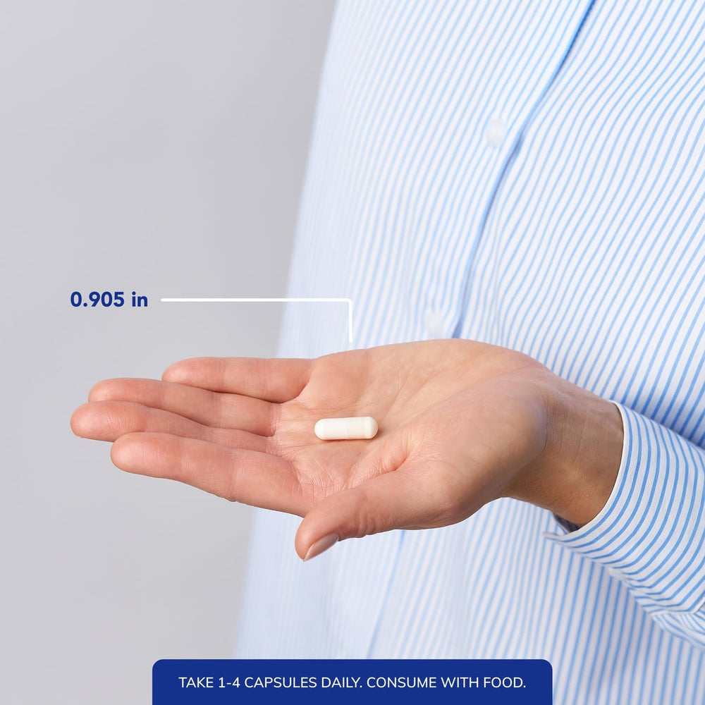 Bottle pours Pure Encapsulations Magnesium Citrate capsules into a glass