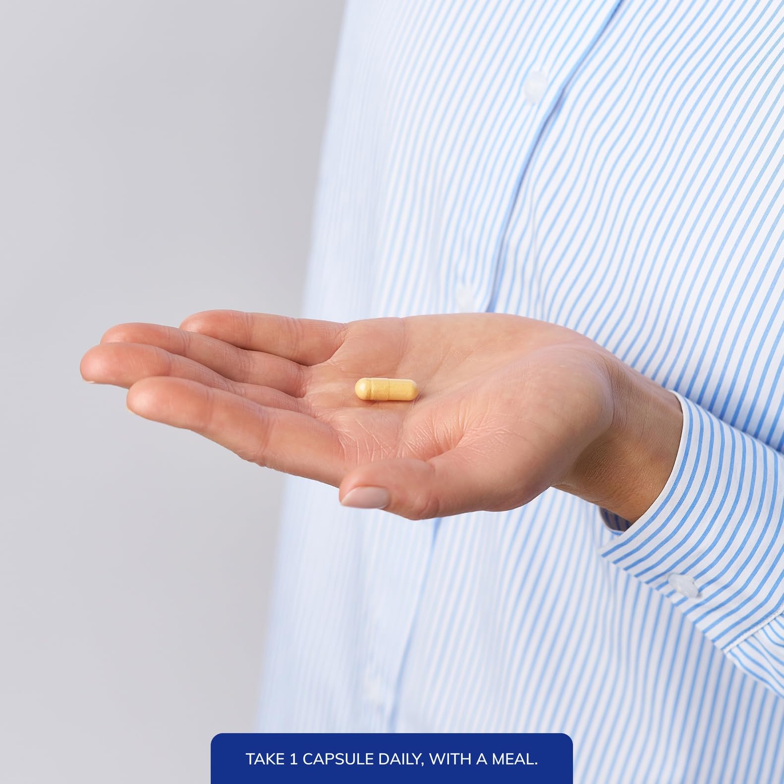Pure Encapsulations PureGenomics B-Complex tablets on a neutral surface signaling energy metabolism.