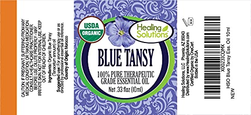 Pure Gold Blue Tansy oil with diffuser setup for cozy winter aromas.