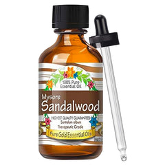 Pure Gold Mysore Sandalwood Essential Oil bottle with dropper for aromatherapy blends