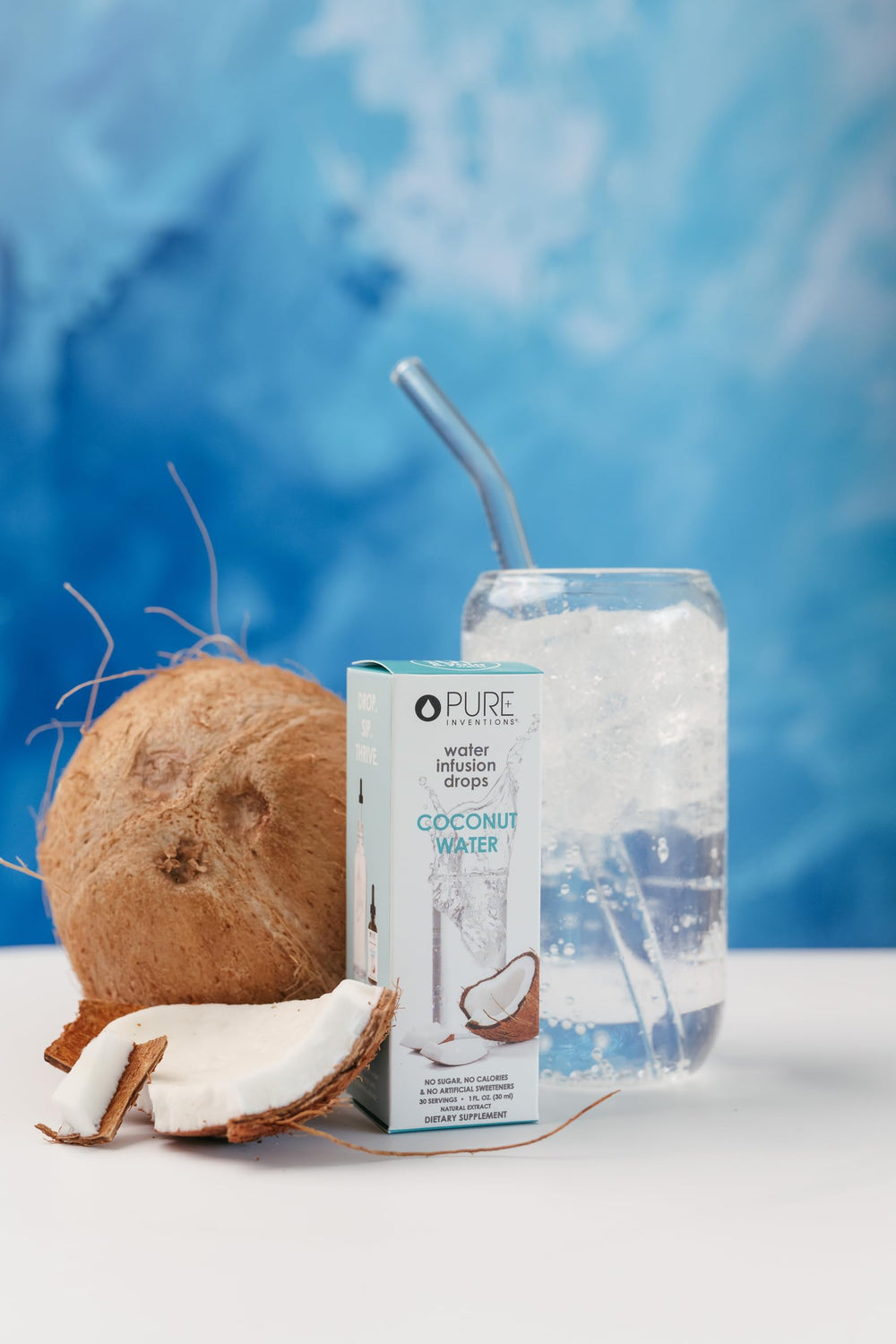 Pure Inventions Coconut Water Drops in a clear glass with tropical aroma
