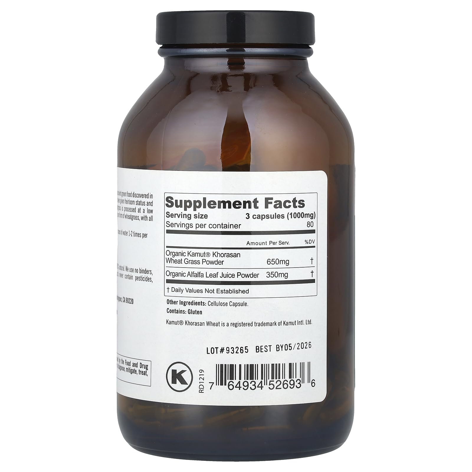 Pouring Pure Planet Heirloom Wheatgrass capsules for easy daily wellness.