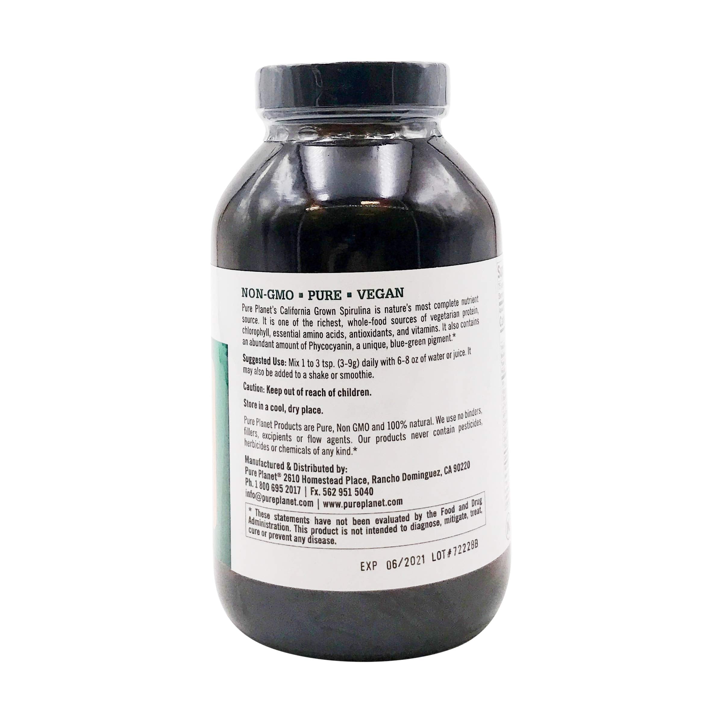 Pure Planet spirulina powder scoop beside the jar for smoothies.