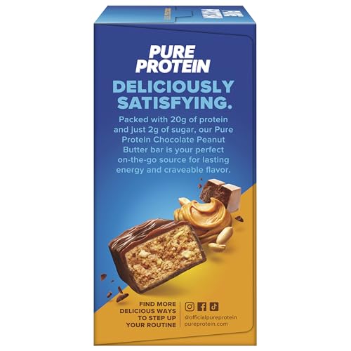 Pure Protein chocolate peanut butter bar texture close-up, showing a chewy bite.