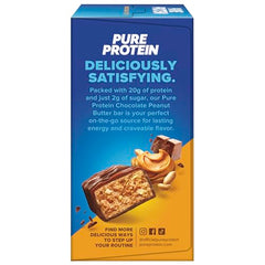Pure Protein chocolate peanut butter bar texture close-up, showing a chewy bite.