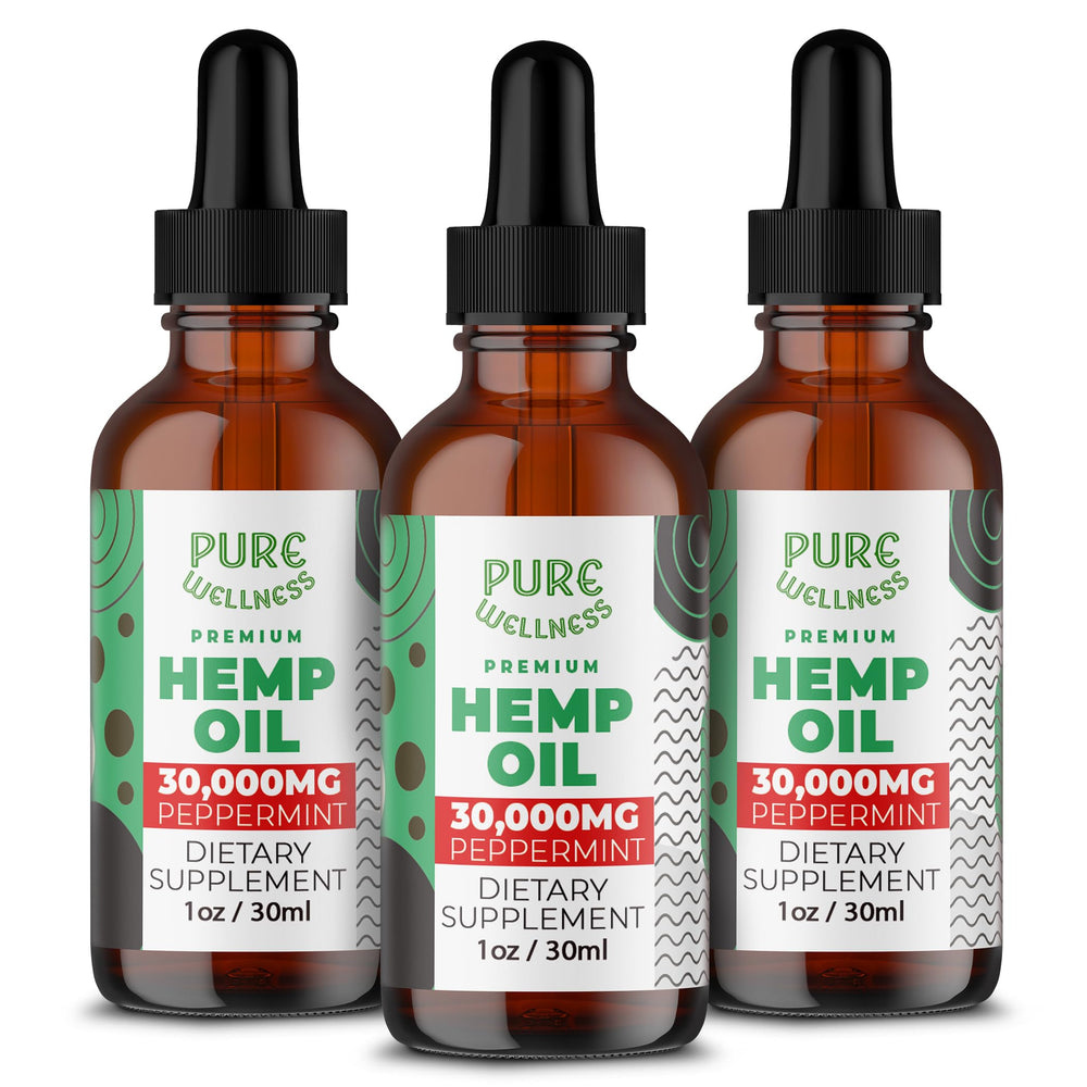 Pure Wellness Organic Hemp Seed Oil peppermint bottle pour illustrates convenient daily use for calm relief
