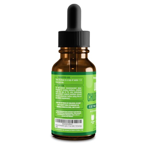 Glass of water with mint-flavored chlorophyll drops for refreshing hydration.