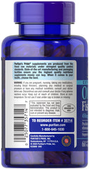 Puritan's Pride Omega-3 capsules in hand, ready to take.