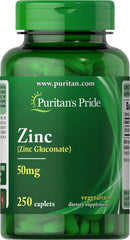 Puritan's Pride Zinc 50 Mg bottle close-up highlighting dosage and branding for daily wellness.