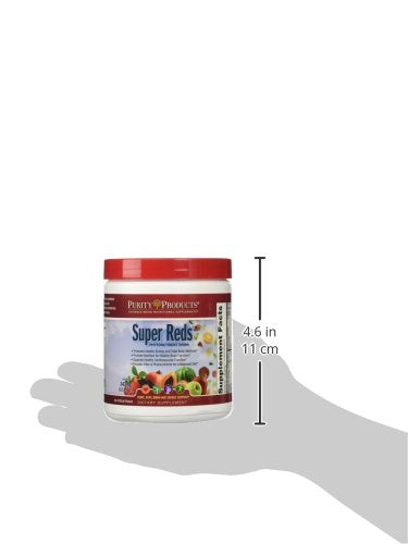 Purity Products Super Reds smoothie-ready setup with glass and fresh fruit.
