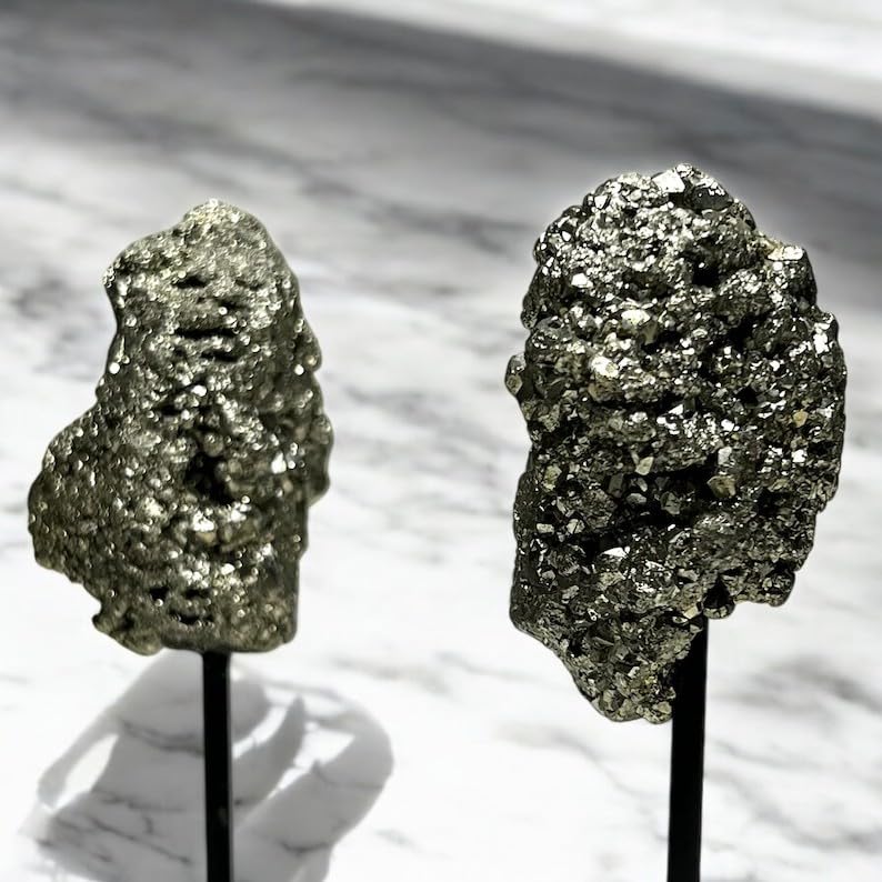 Pyrite cluster on desk decor creates a striking focal point.