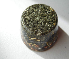 Pyrite single crystal tower buster closeup reveals sparkles for meditation spaces.