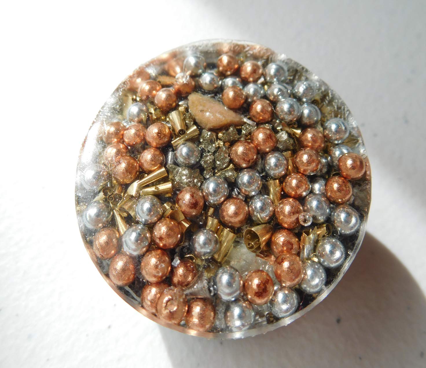 Pyrite tower buster orgone generator base shot fits compact desks.