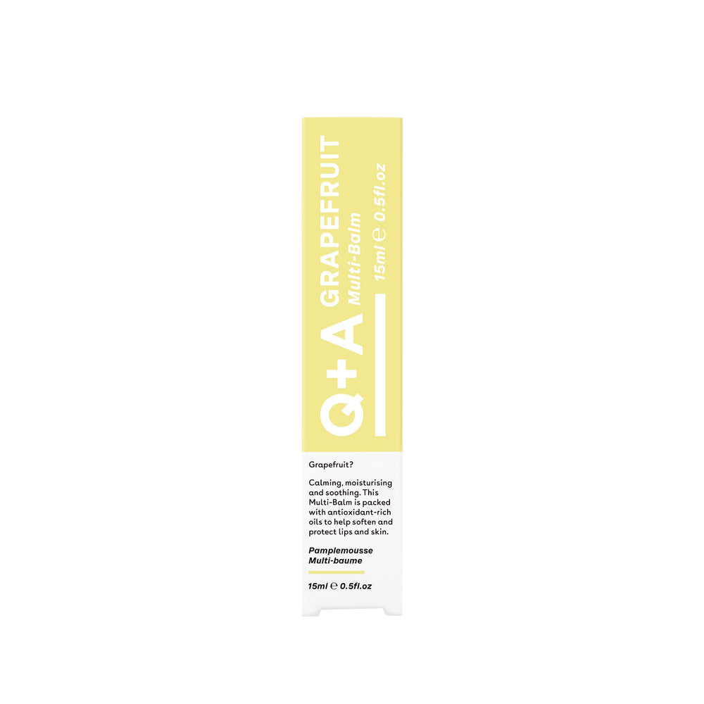 QA Grapefruit Multi-Balm sized for travel or on-the-go use.