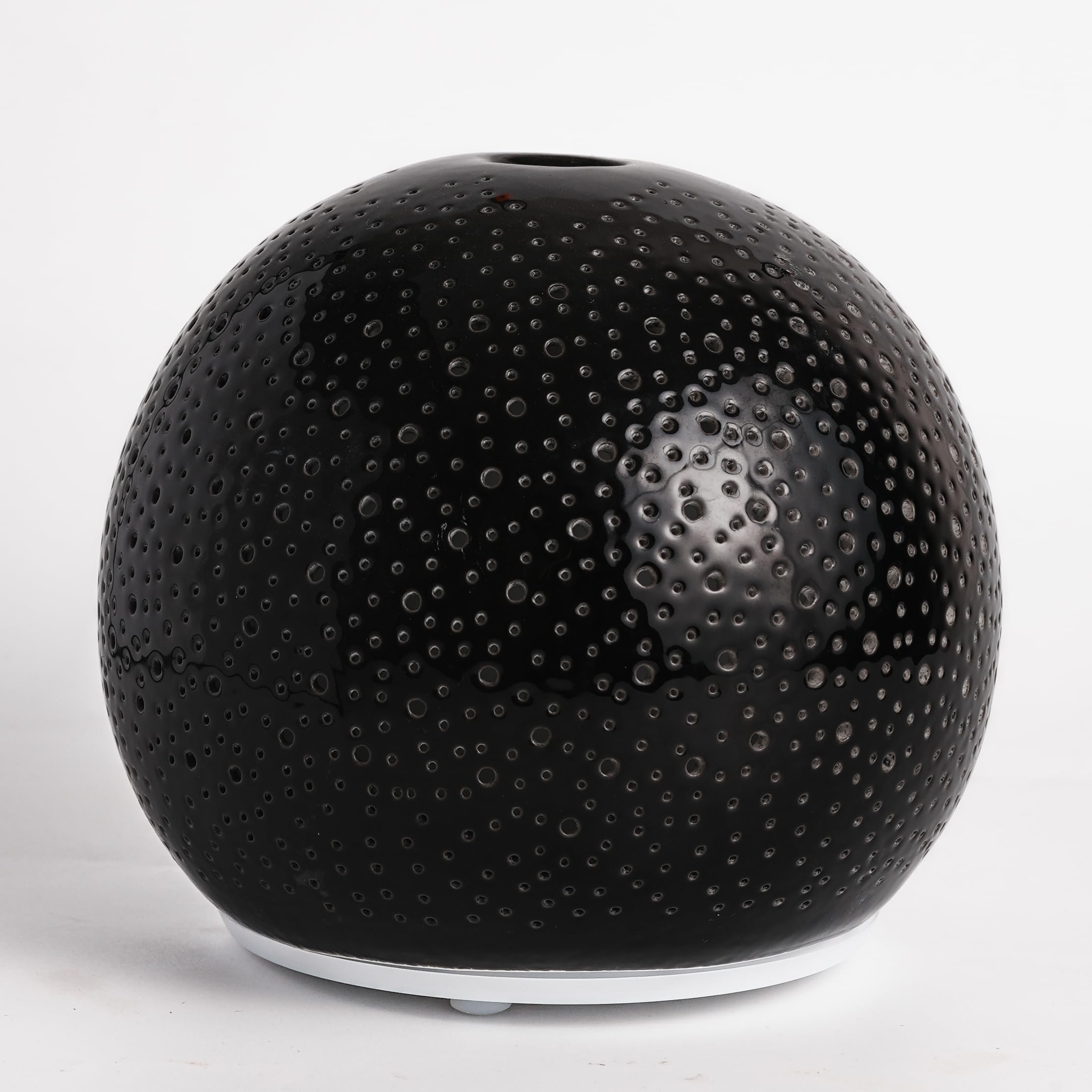 QCYBDGLOV ceramic diffuser front view enhances room ambiance with a gentle aroma.