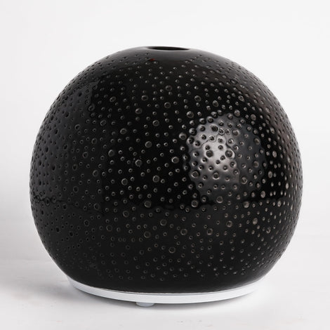 QCYBDGLOV ceramic diffuser front view enhances room ambiance with a gentle aroma.