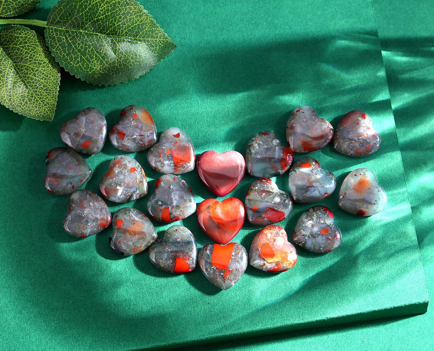 QINJIEJIE African Bloodstone Heart Stone crystals close-up for mindful energy and stress relief.