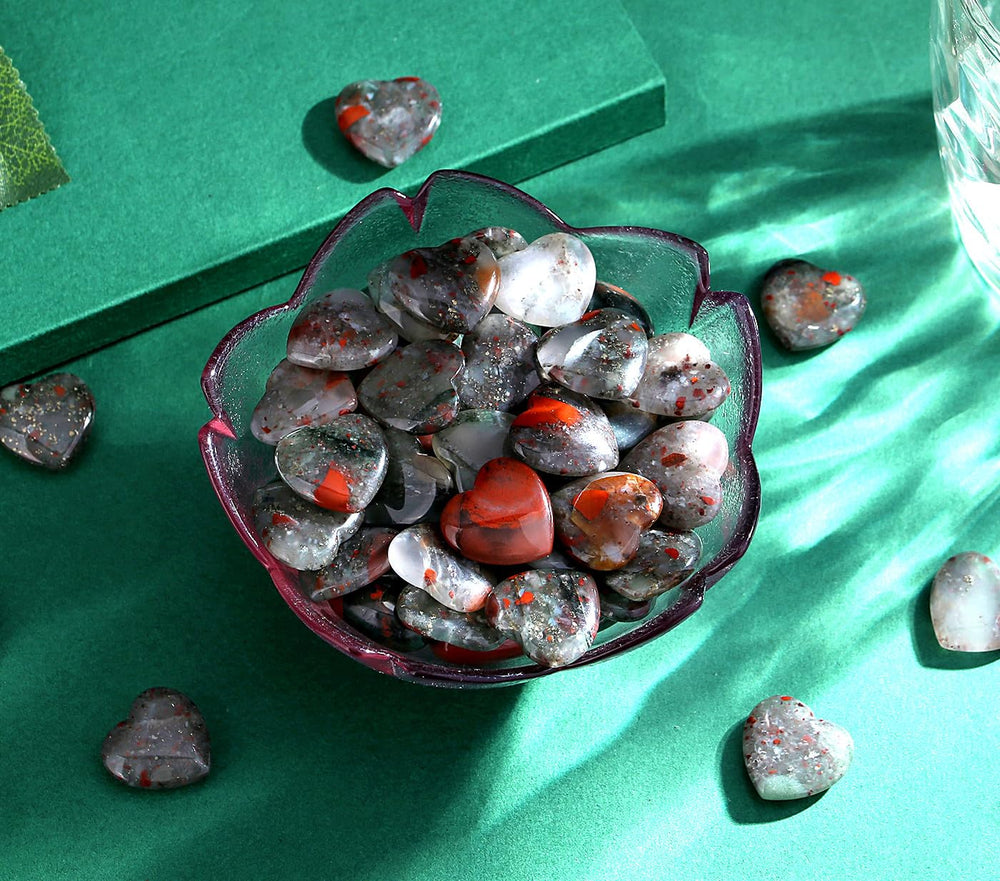 QINJIEJIE Pocket crystal heart in hand ideal for daily carry and focus.