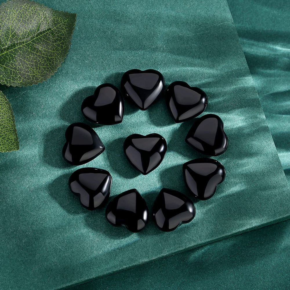 QINJIEJIE obsidian heart crystal grounding during yoga and breathwork.