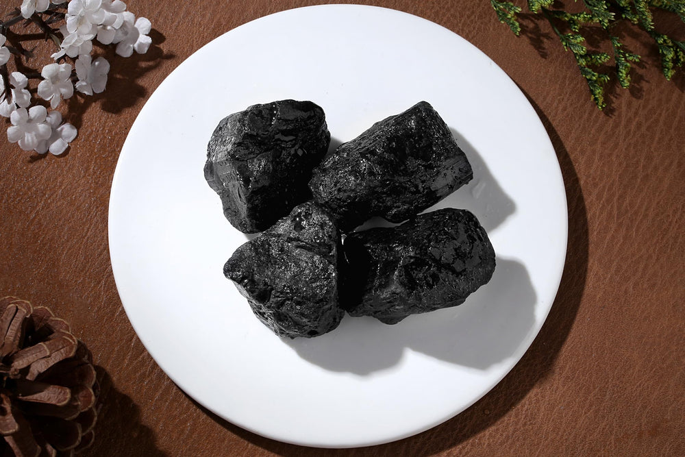 Natural black tourmaline stone suitable for garden and interior accents.
