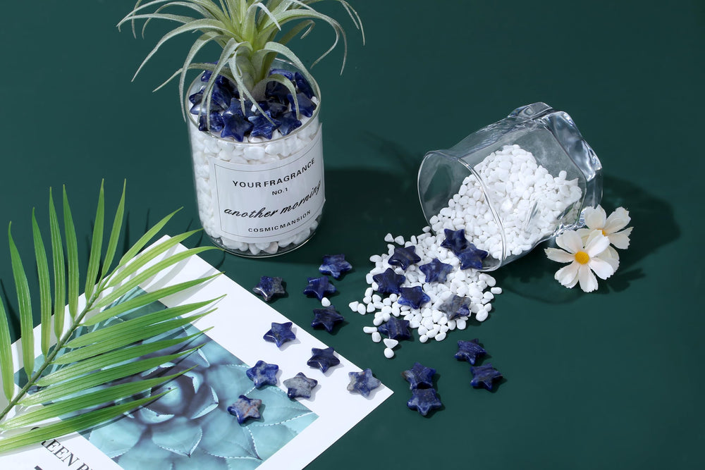 QINJIEJIE blue sodalite star on desk as a calming decor piece.