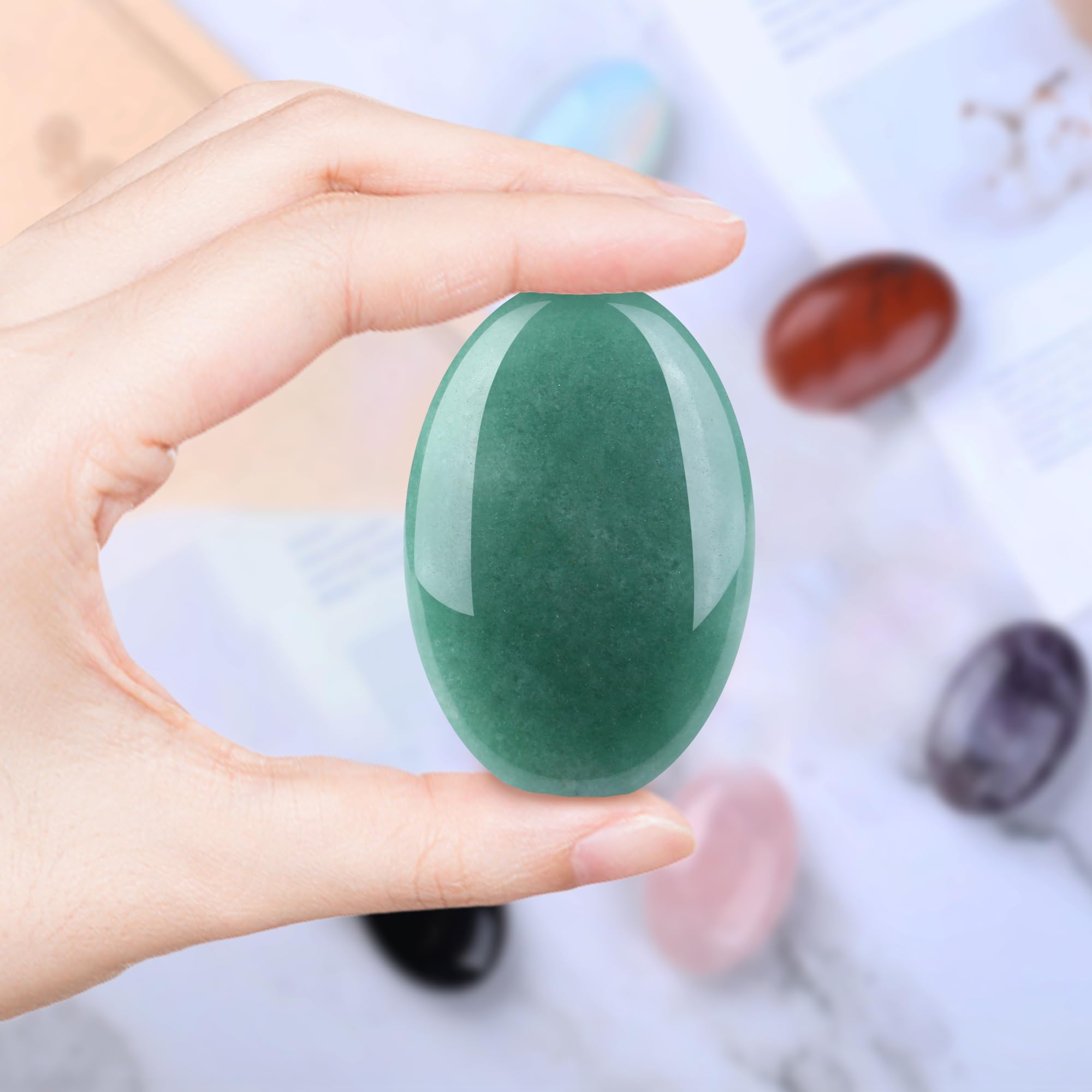 QINJIEJIE palm-stone glow in low light hints at subtle energy
