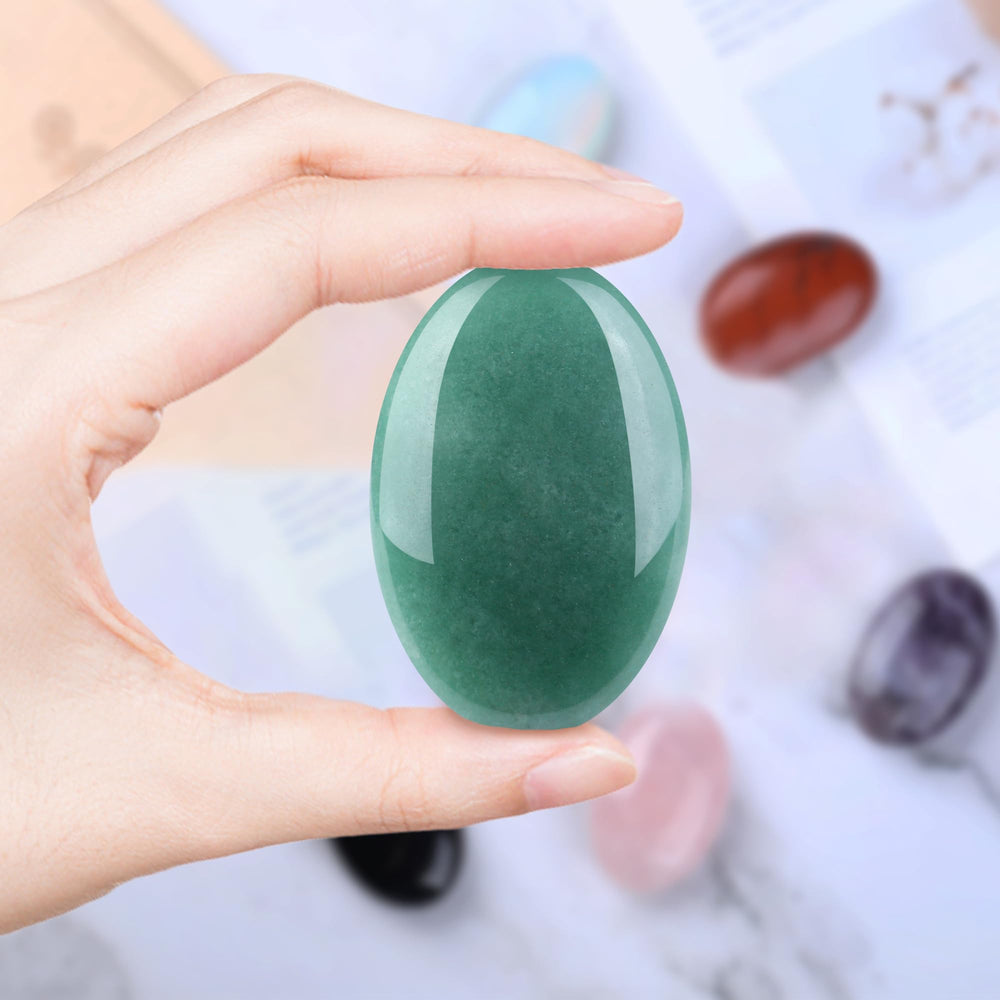 QINJIEJIE palm-stone glow in low light hints at subtle energy