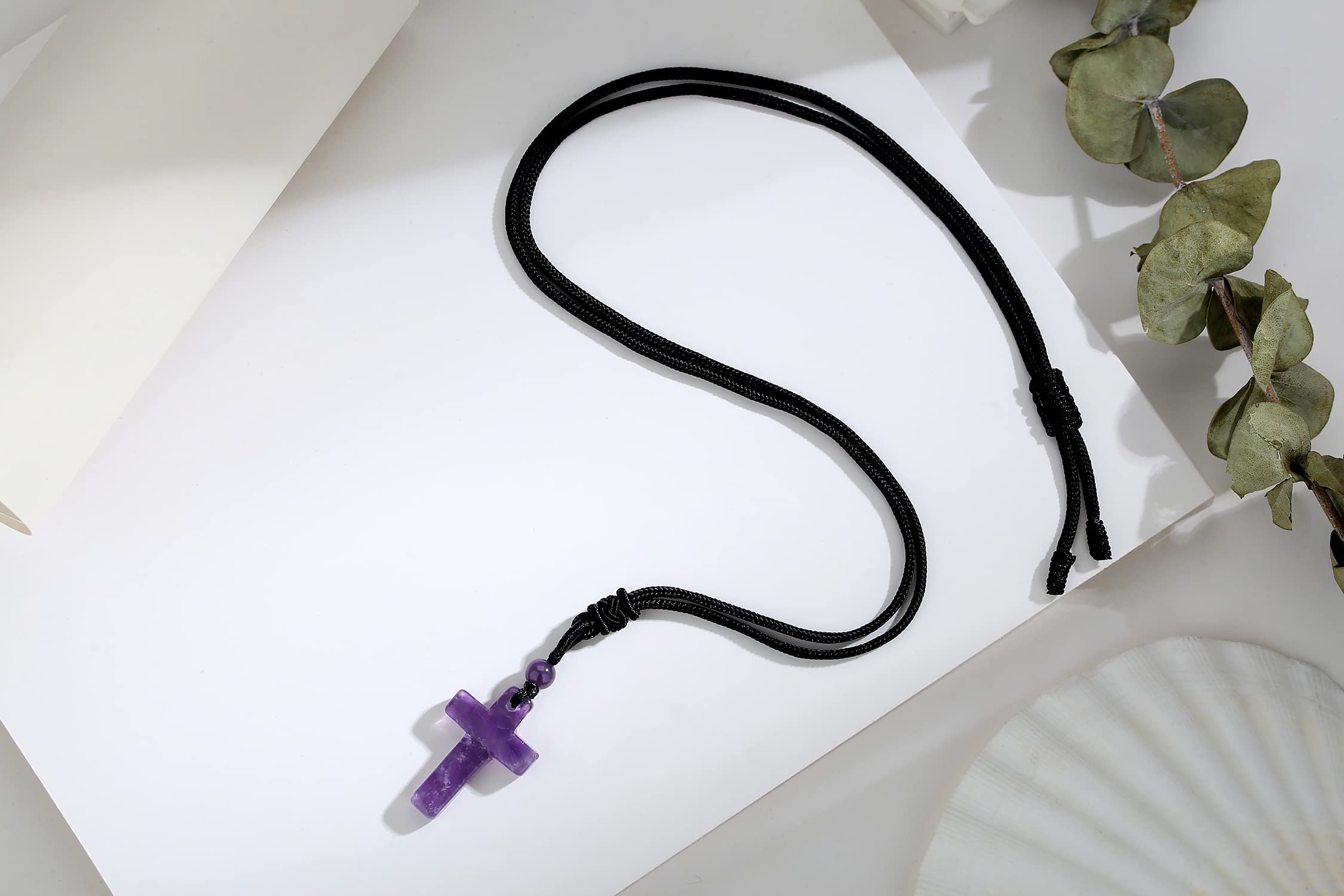 QINJIEJIE natural gemstone quartz cross detail highlighting authentic texture