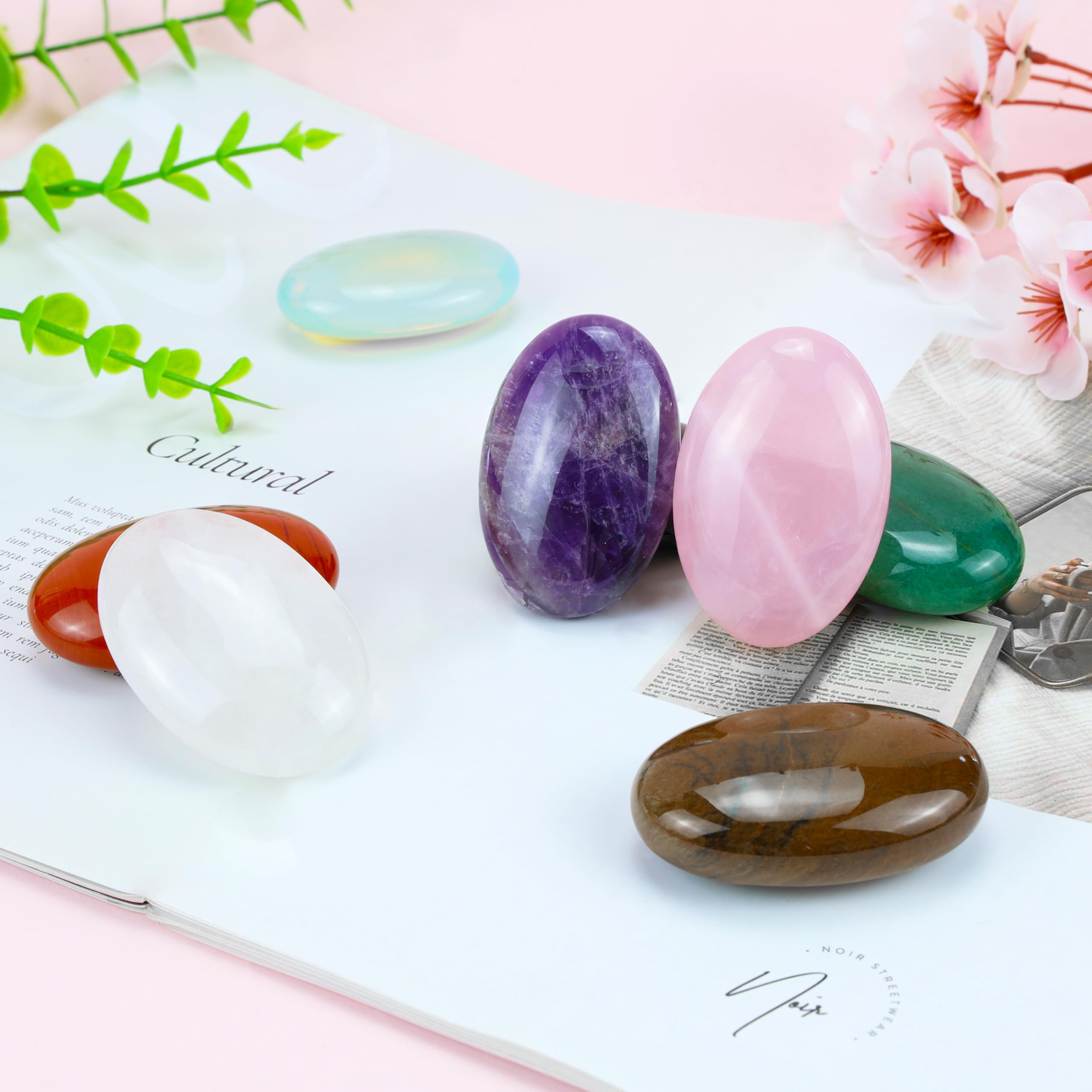 QINJIEJIE obsidian energy balancing stone for grounding rituals.