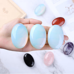 QINJIEJIE Opal palm stone in hand for balance and focus
