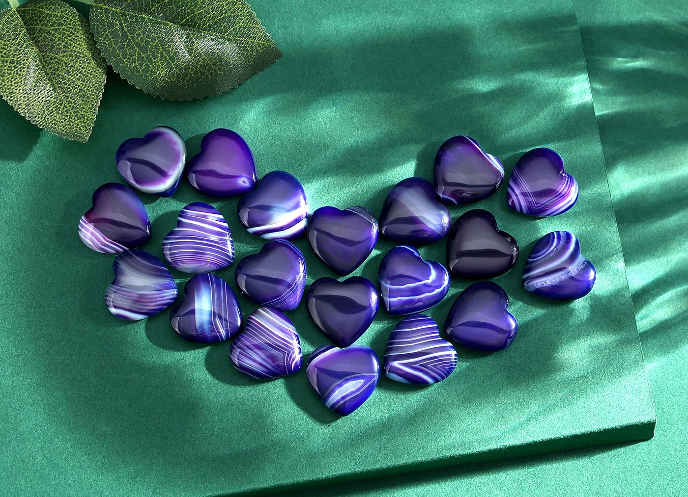 QINJIEJIE purple agate heart pocket stone with natural veining.