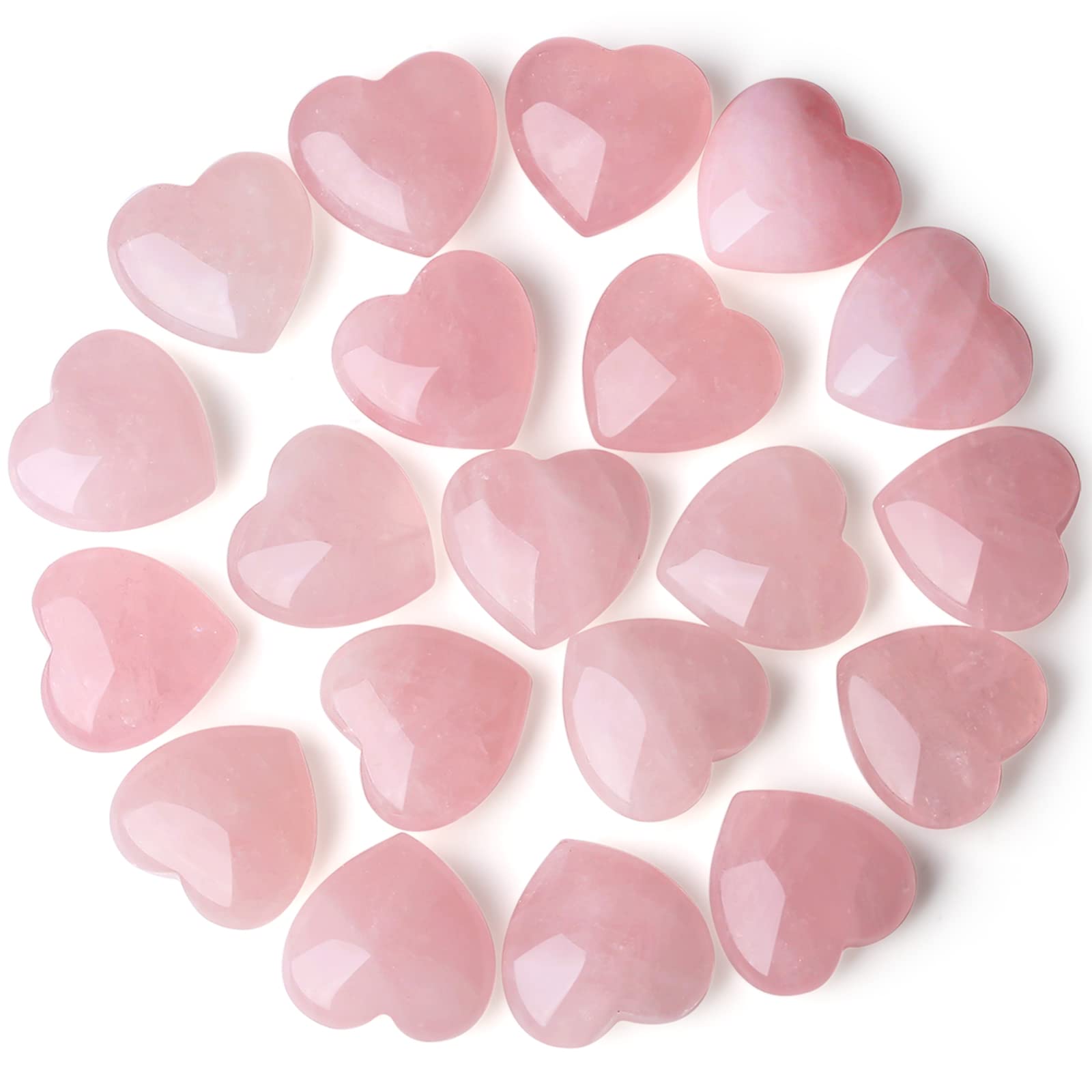 QINJIEJIE rose quartz heart palm stone resting on desk to soften workspace energy