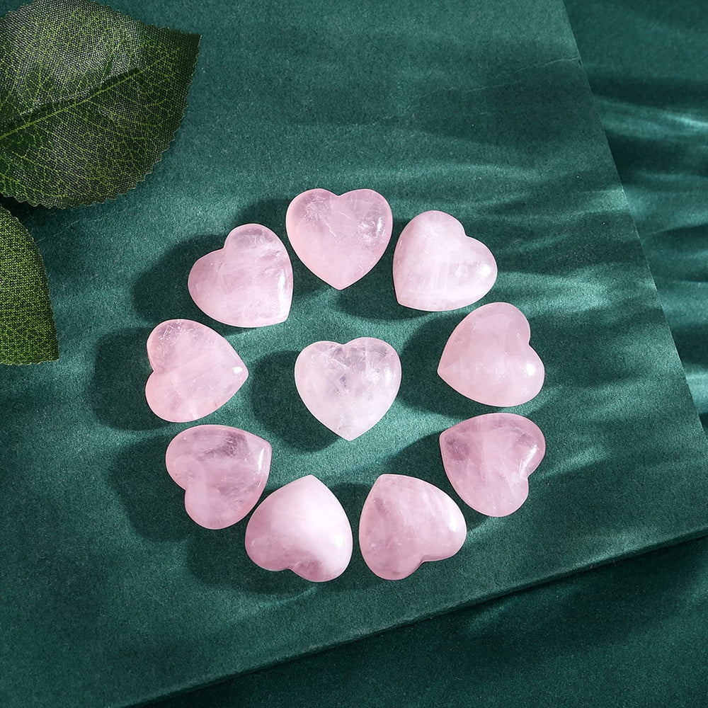 QINJIEJIE rose quartz heart palm stone used during meditation for calm focus