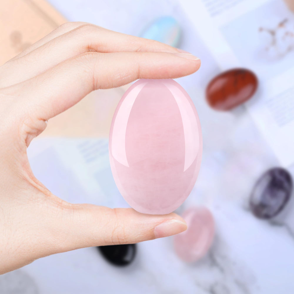 QINJIEJIE rose quartz palm stone as desk decor to create a soothing space.