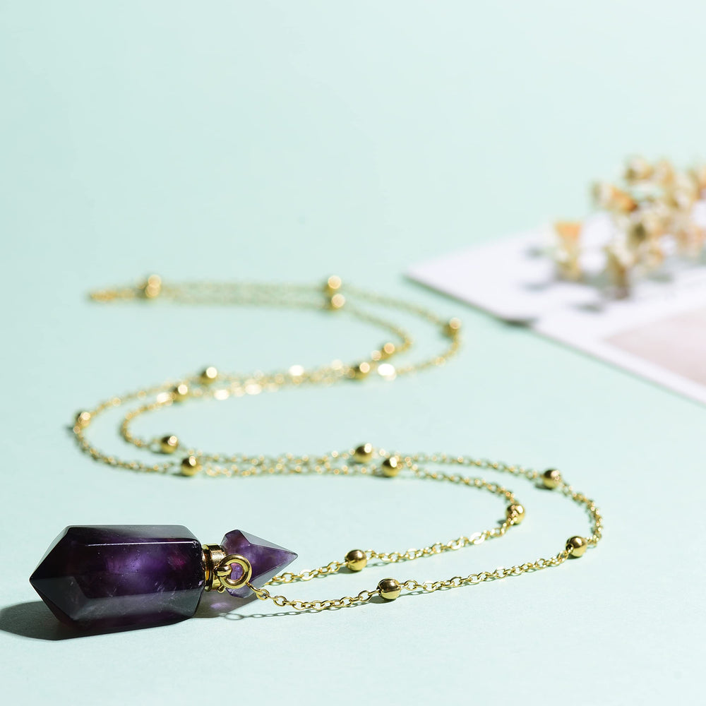 QIQIXIN Amethyst travel diffuser pendant fits 4–6 drops for trips.