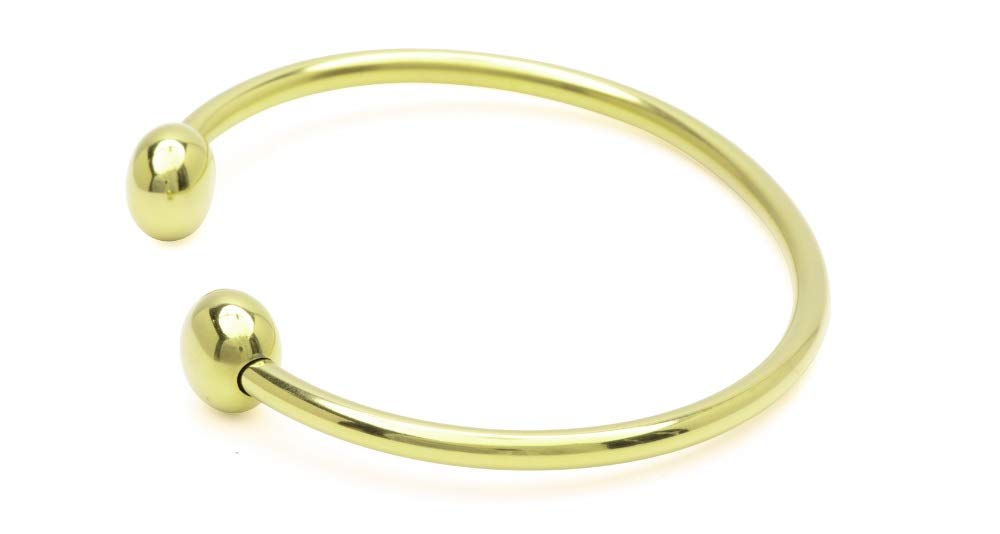 QRAY bracelet worn on wrist during activity suggesting focus and balance.