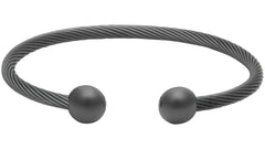 QRAY Gun Metal Deluxe Bracelet on golf setup suggesting focused wear during play.
