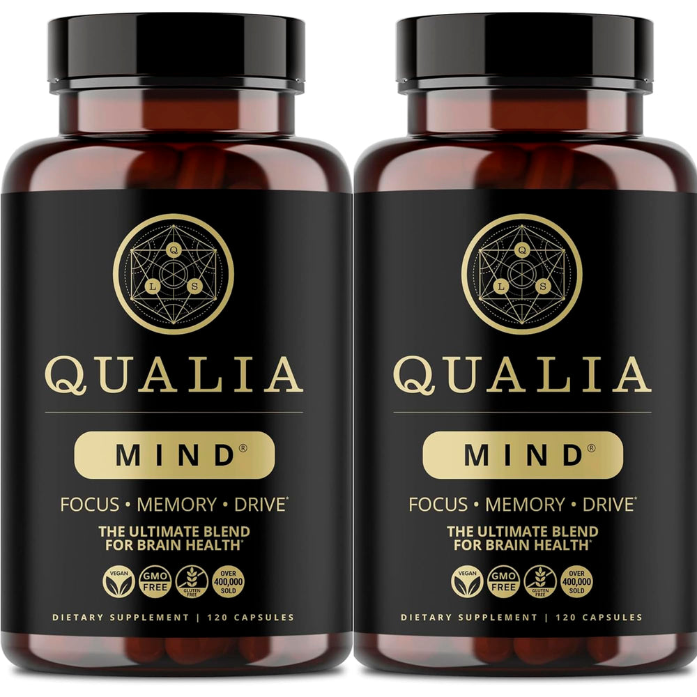 Qualia Mind capsules close-up showing premium nootropic for sharper focus and sustained energy.