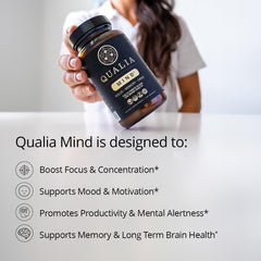 Qualia Mind packaging on desk suggesting daily routine and sustained mental energy.