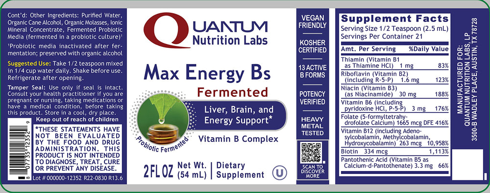 Glass with diluted Quantum Nutrition Max Energy B drops demonstrating easy mixing with water for daily use.