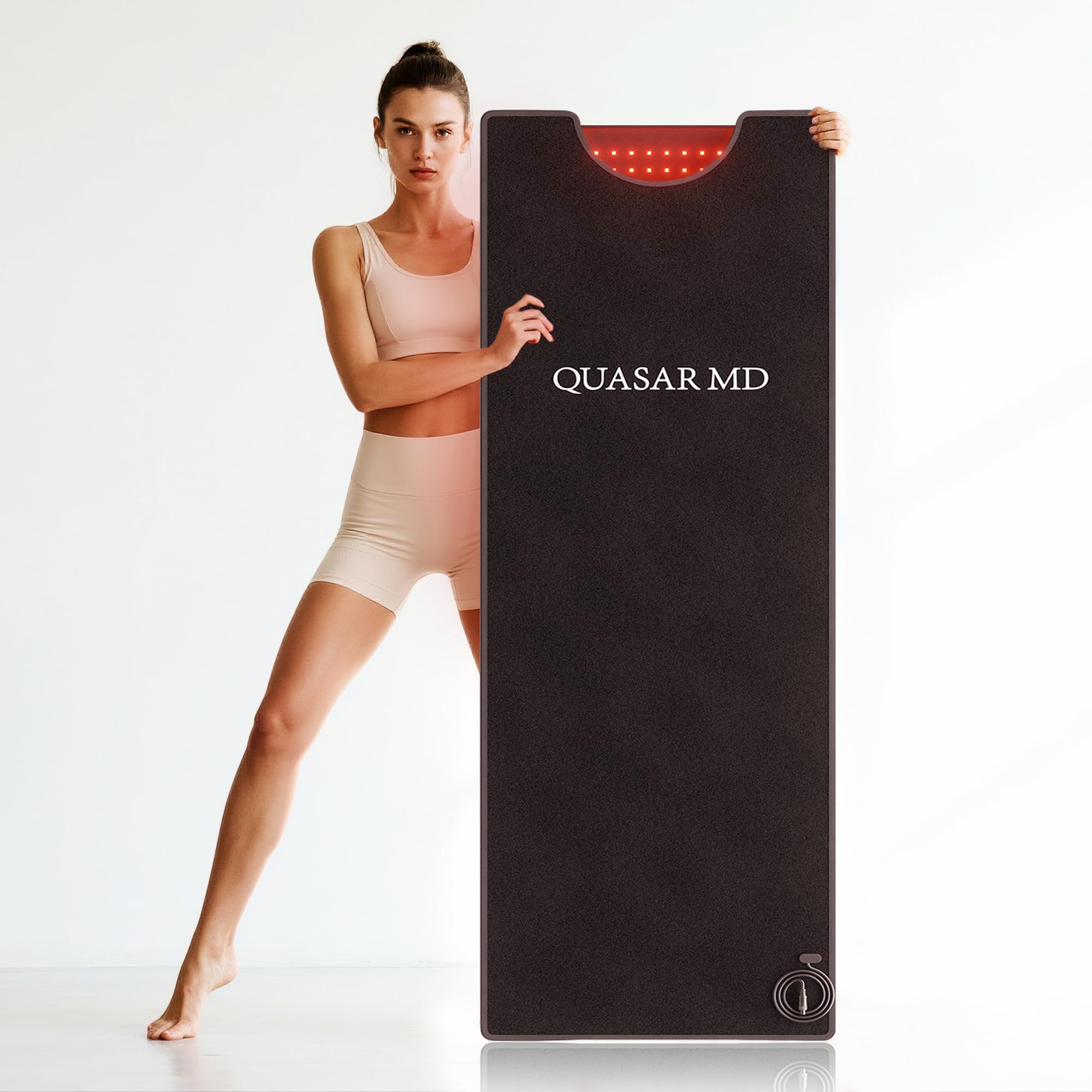 Quasar MD infrared full body mat during yoga demonstrates flexible positioning.