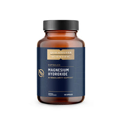 Quicksilver Magnesium Hydroxide bottle pour for GI regularity and bowel support.