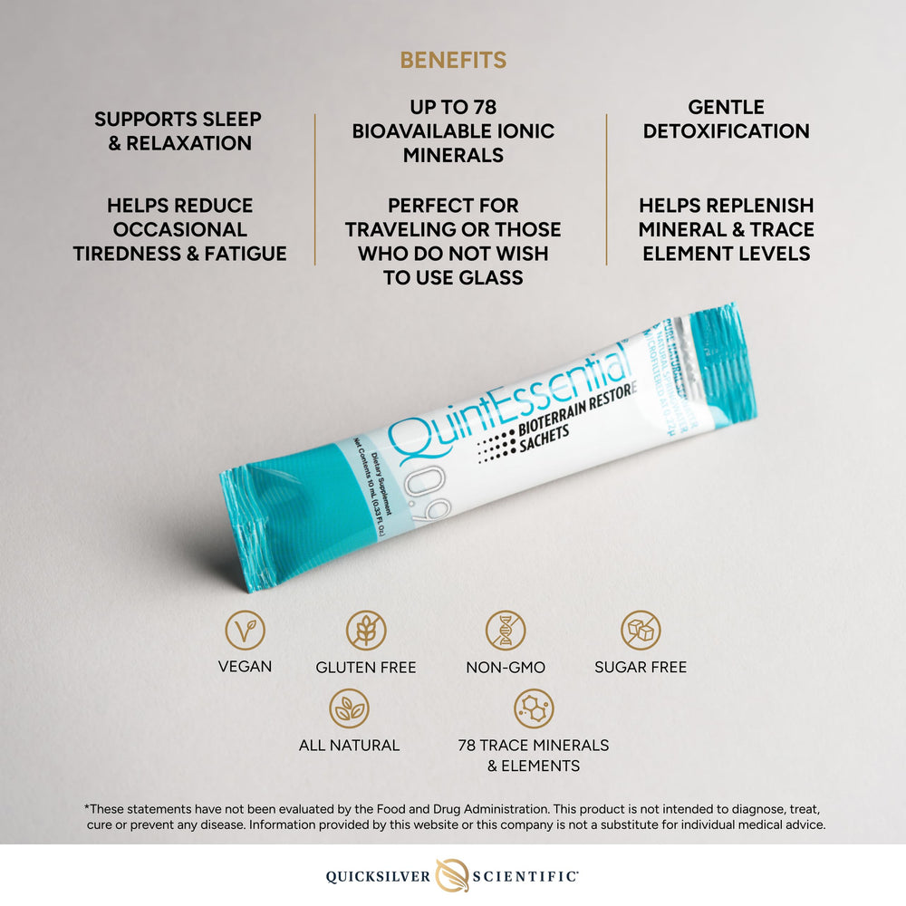 Quicksilver Scientific Quintessential 0.9 sachets poured into a glass for quick hydration