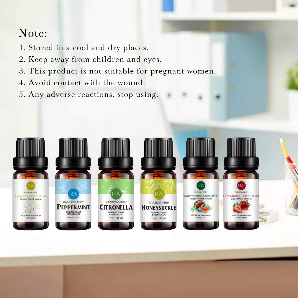 Rainbow Abby freesia essential oil bottle offers floral notes for ambiance.