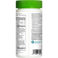 Rainbow Light Women's Multivitamin bottle on kitchen counter for daily routine.