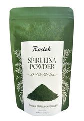 Raslok Pure Spirulina Powder jar close-up, vibrant green powder for daily energy.