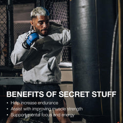 Pouring RAW Christopher's Secret Stuff into a shaker for energy.