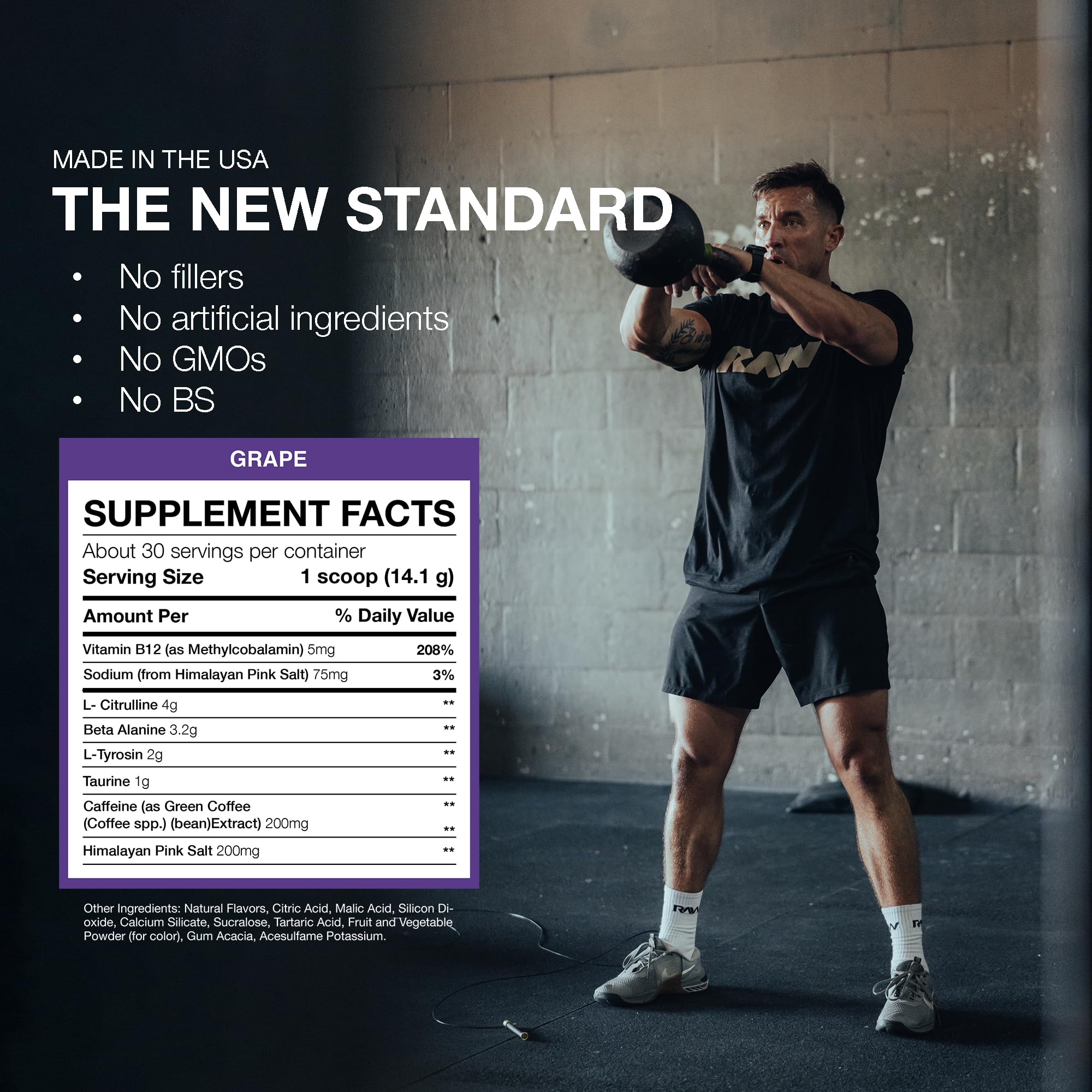 RAW Essential Pre-Workout grape mix glass demonstrating powder dissolving