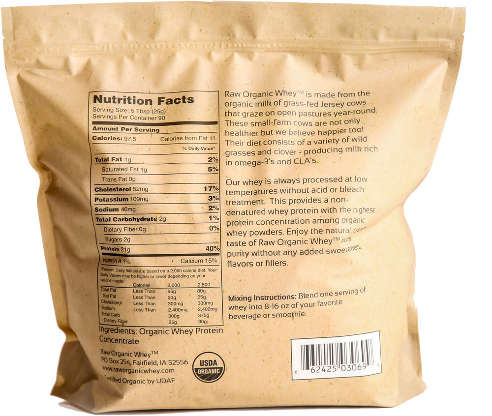 Raw Organic Whey scoop beside powder for convenient protein